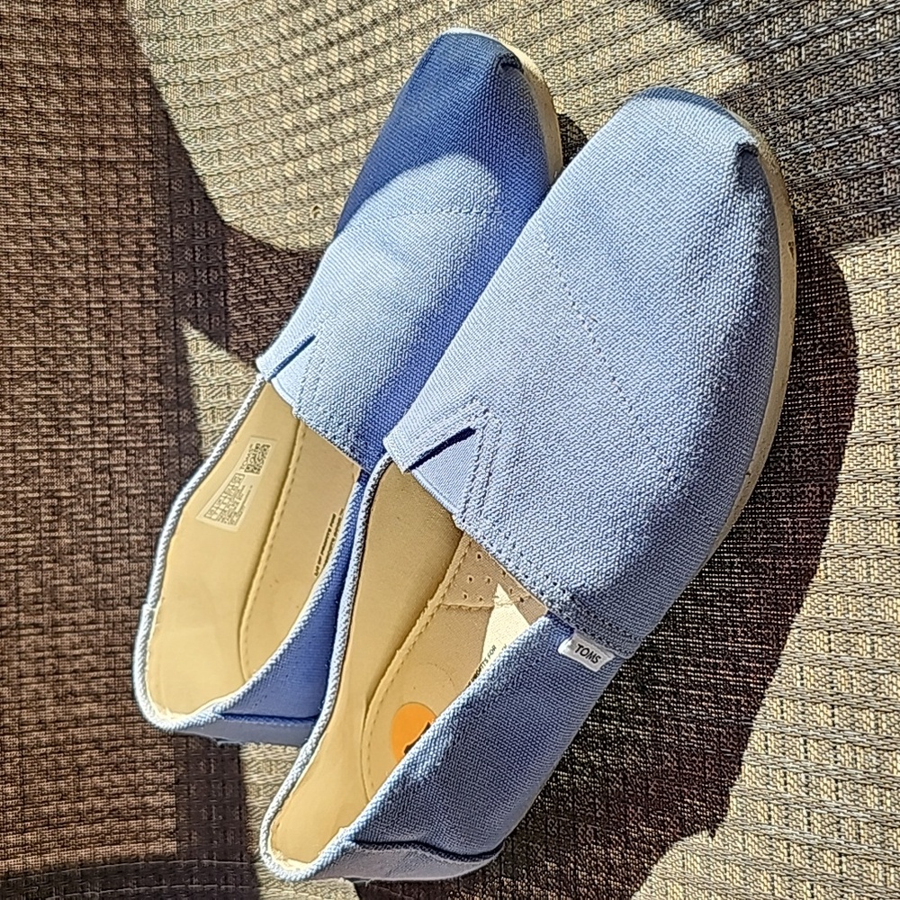 Tom's size 7 light blue slip on loafer. Gently worn